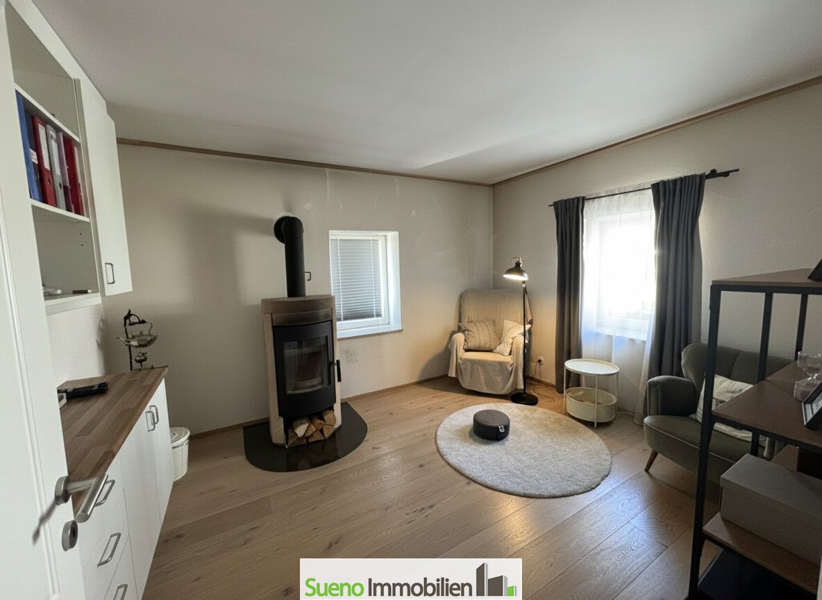 ofenzimmerwohnzimmer west und nordseitig mit tuer vom schlafzimmer kommend